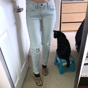 Zara jeans with unfinished hem and ripped knees